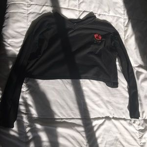 Long sleeve black crop top with embroidered rose